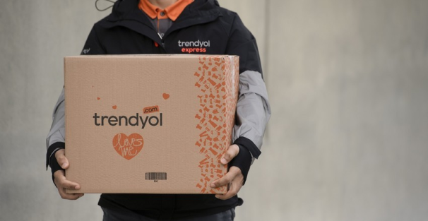 holding a trenydol shipping box